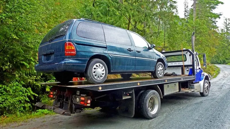 Brampton flatbed towing a cargo van